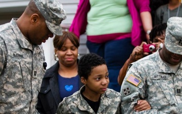 Soldiers help boy live military dream