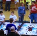 Tulsa engineers mentor youngsters at robotics competition