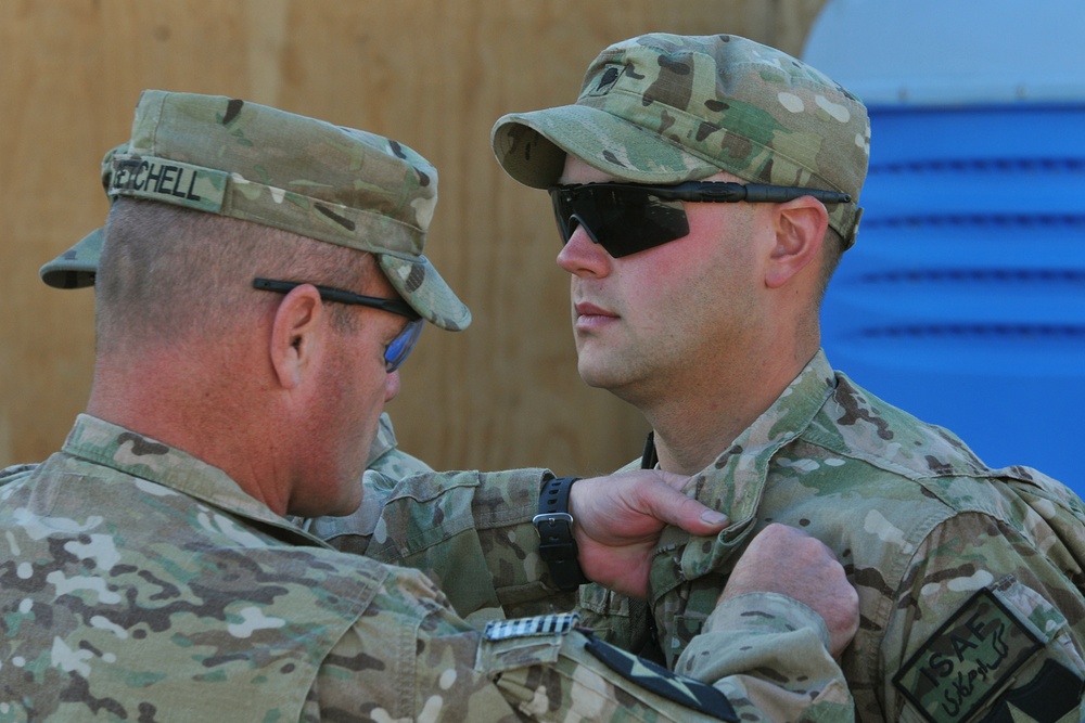 Field artillery soldiers receive CABs, medic receives CMB