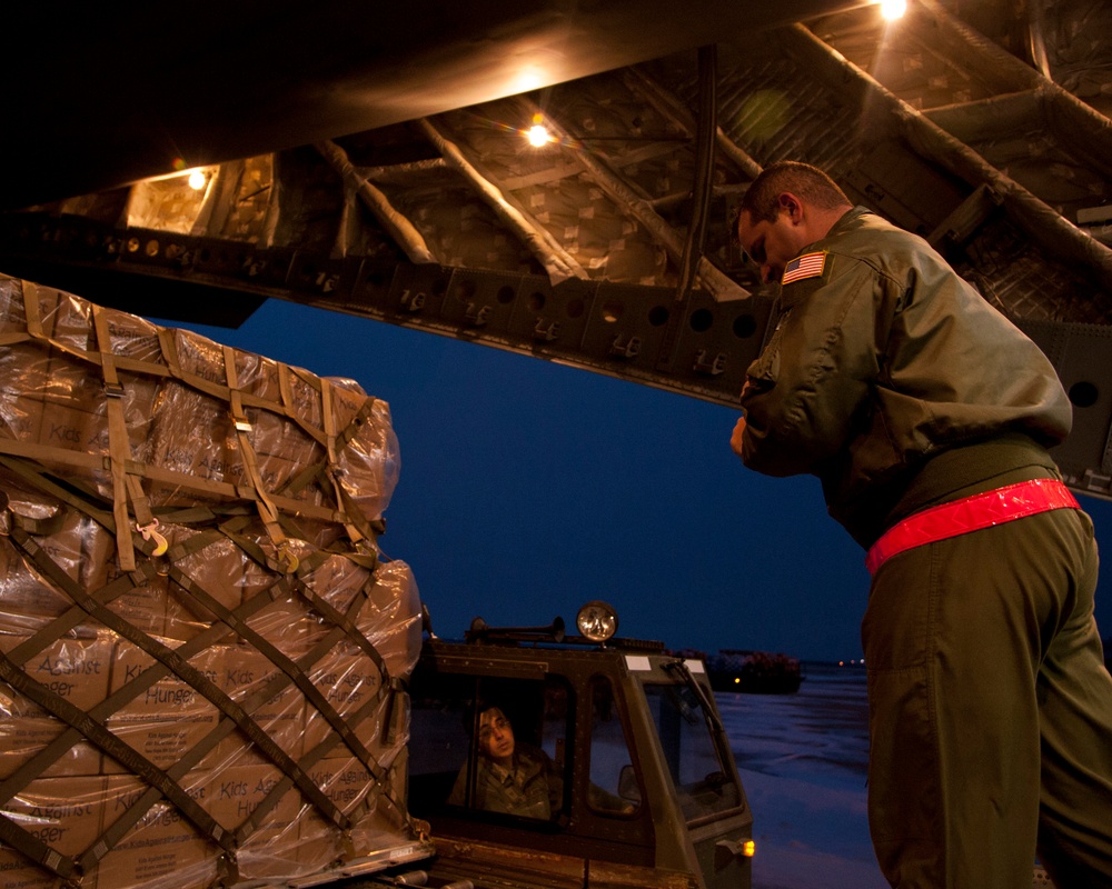 Altus airmen aboard a C-17 Globemaster III from the 97th Air Mobility Wing delivered the largest single-day humanitarian aid delivery since 1998 to Port-au-Prince, Haiti, Dec. 28, 2012.