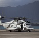 Marines maintain helicopters during holidays