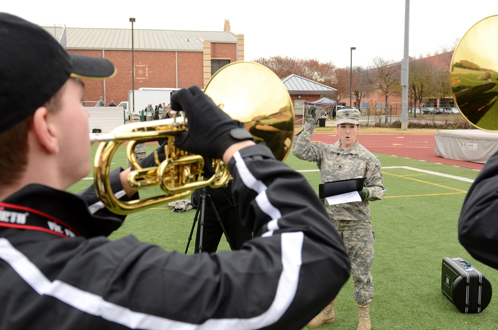 Staff Sgt. McLaughlin conducts the horns