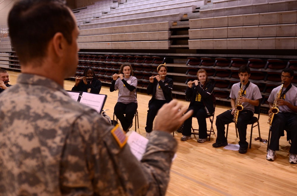 Woodwinds warm up their instruments