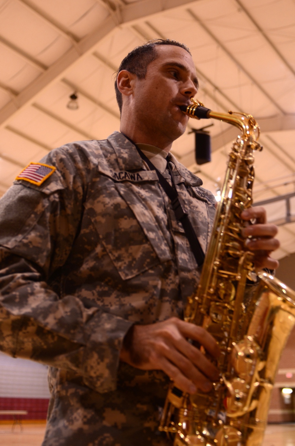 Sgt. 1st Class Sacawa demonstrates the saxophone