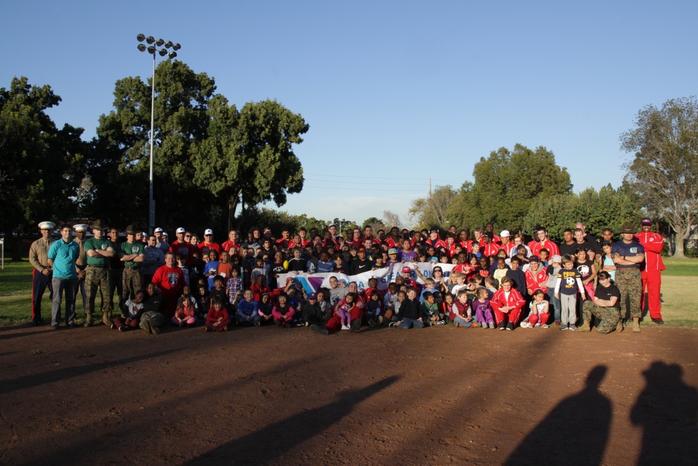 Semper Fidelis All-American Bowl West team community service project