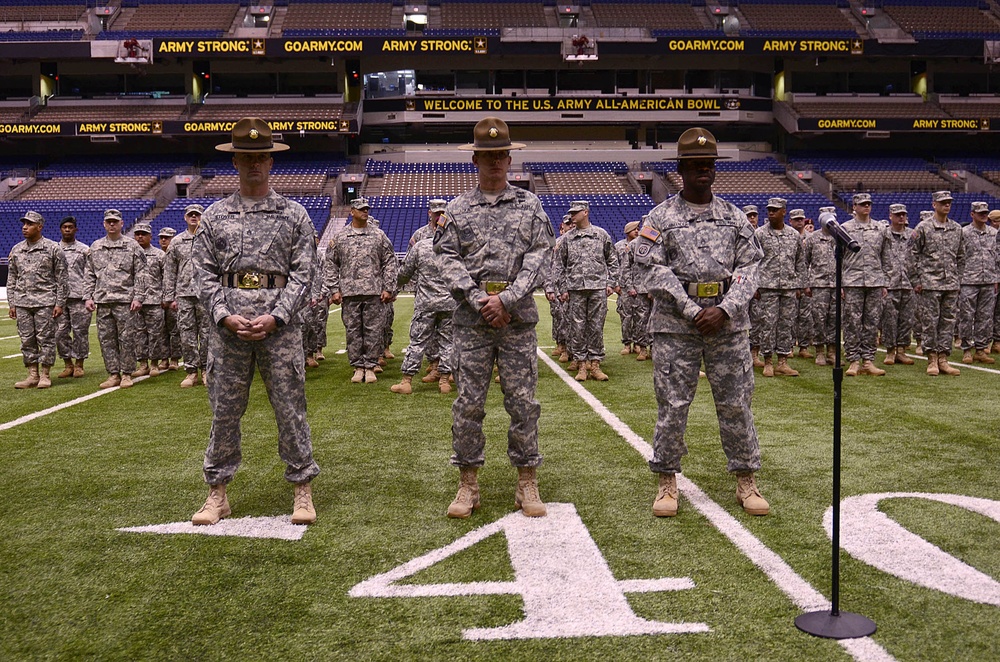 Drill Sergeants stand In front Of soldier heroes