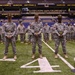 Drill Sergeants stand In front Of soldier heroes