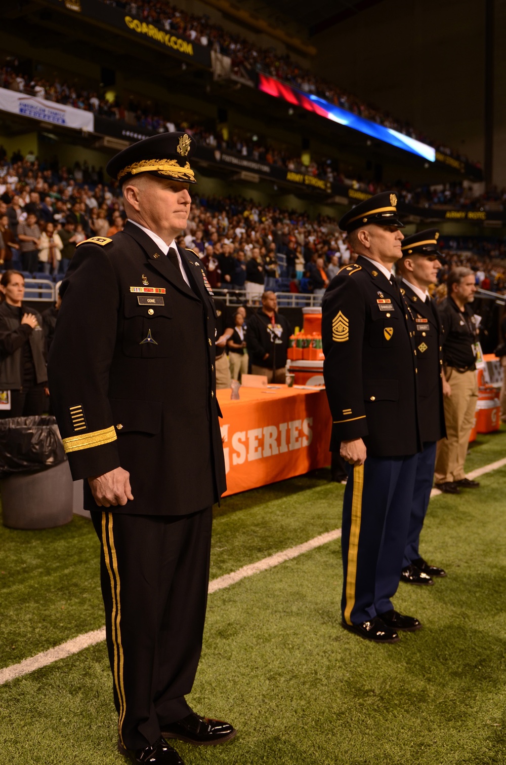 Gen. Cole and Sgt. Maj. of the Army Chandler Stand at Attention