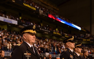 Gen. Cole and Sgt. Maj. of the Army Chandler Stand at Attention