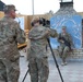CSM Thomas Moore assists soldier