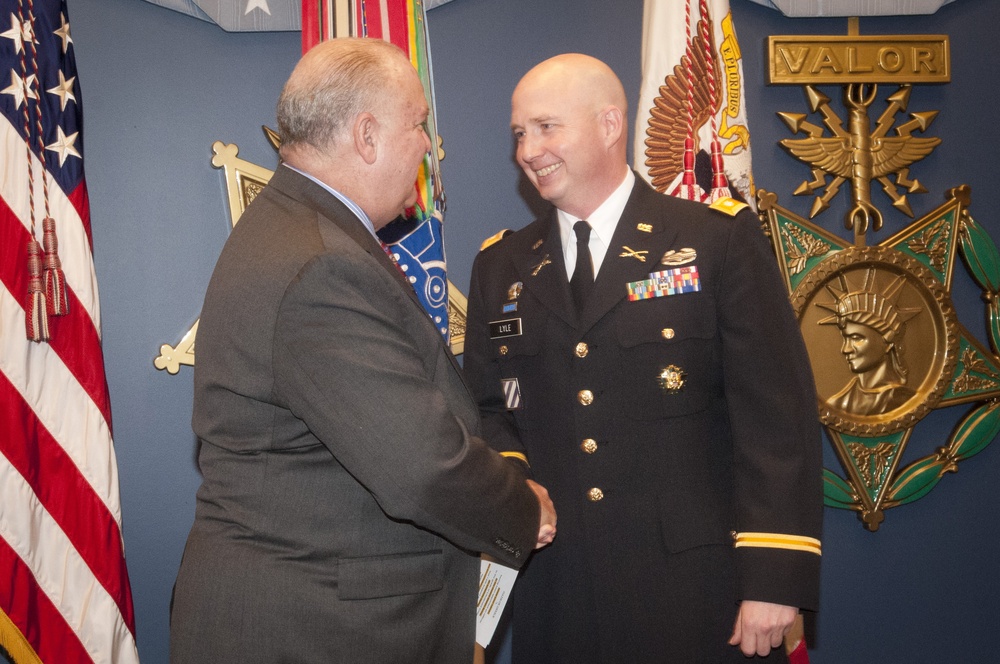Army Under Secretary promotes old team member