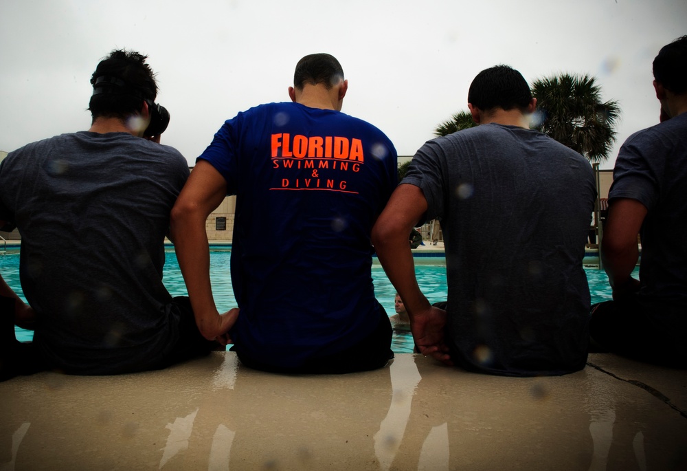 920th Rescue Wing Guardian Angels train with the UF swim team