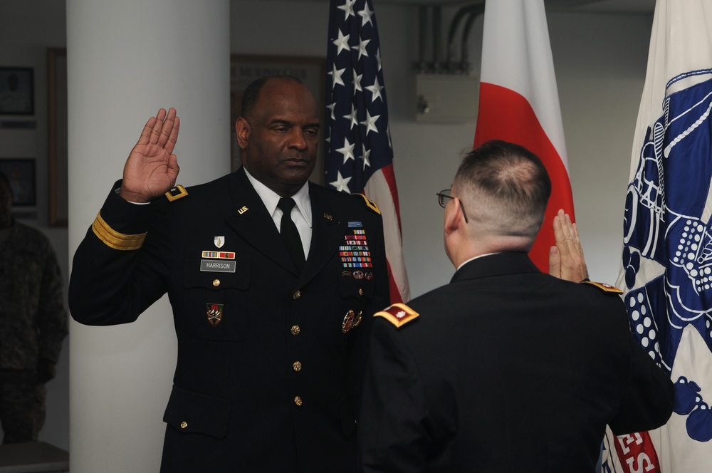 Maj. Jeffrey Schultz pins on lieutenant colonel in Japan