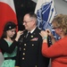 Maj. Jeffrey Schultz pins on lieutenant colonel in Japan