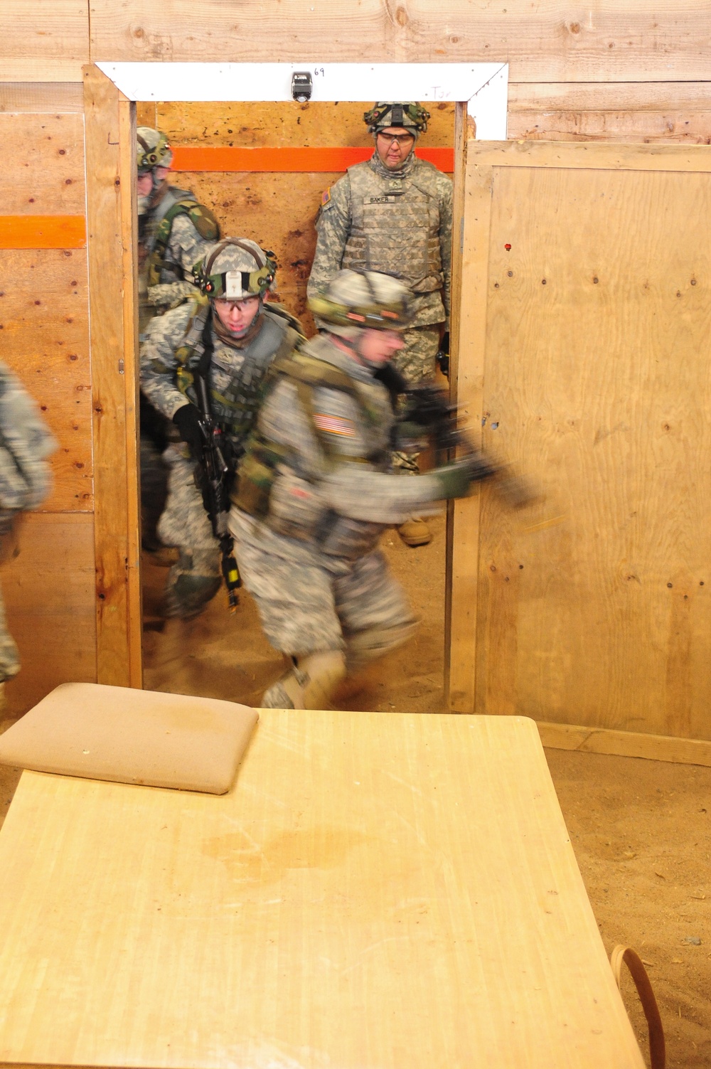 The 1-4 Infantry Regiment clearing buildings