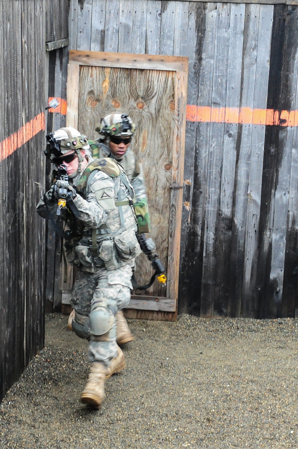 The 1-4 Infantry Regiment clearing buildings