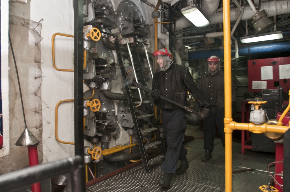 Engineer personnel perform burner barrel change