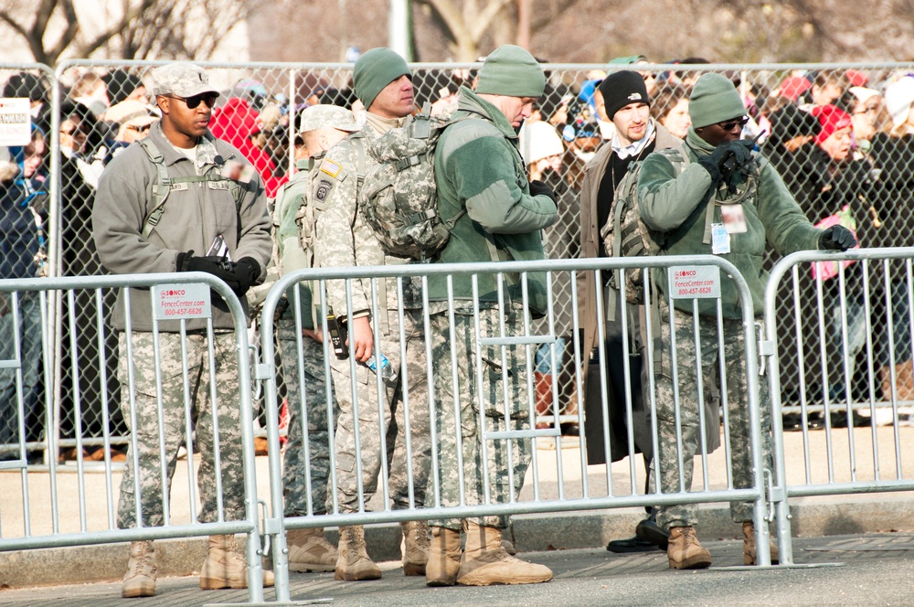 Members of the Mississippi Army National Guard help with crowd control on 3rd Street