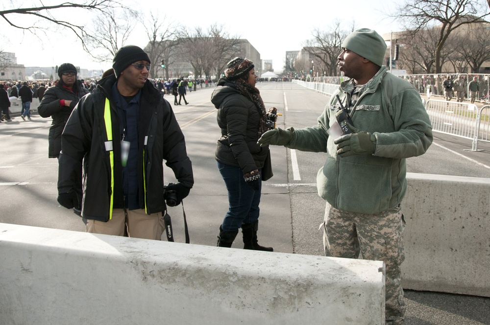 A member of the Mississippi Army National Guard helps with crowd control