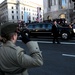 Young marine salutes President Obama as he waves to the crowd along Pennsylvania Avenue, Washington