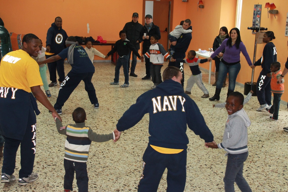 USS Mahan sailors volunteer at Naples-area orphanage
