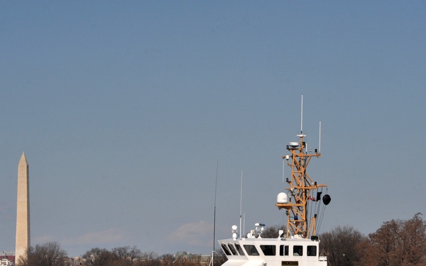 Crewmembers aboard the Coast Guard Cutter Cochito enforces a security zone on the Potomac River during the 57th Presidential Inauguration
