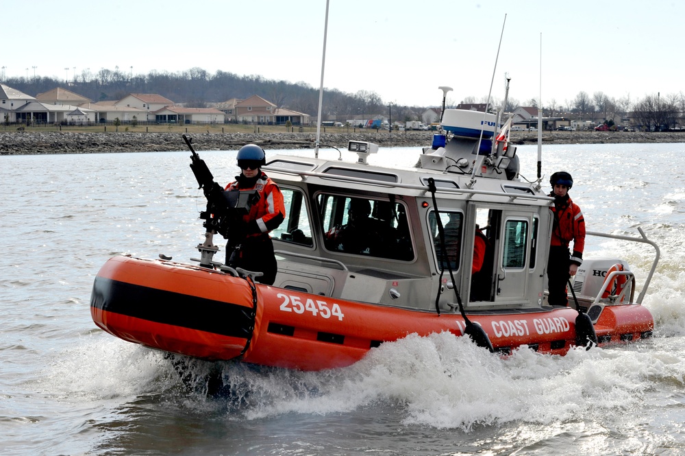 The Coast Guard patrols the Potomac River, enforcing security zones during the 57th Presidential Inauguration.