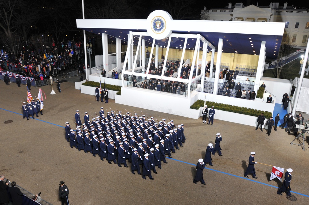 US Coast Guardsmen salute President Barack Obama