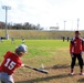 Youth baseball players learn from professionals