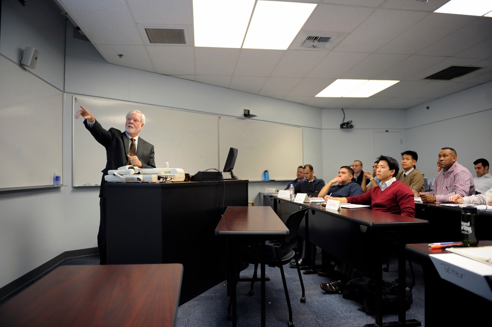 Former under secretary of the Army explores federalbBudget with NPS Business School students