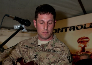 Deployed sailor starts band, amps up morale