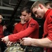 USS John C. Stennis sailors at work