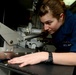 USS John C. Stennis sailors at work