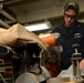 USS John C. Stennis sailors at work
