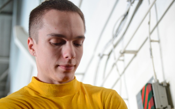 USS John C. Stennis sailors at work