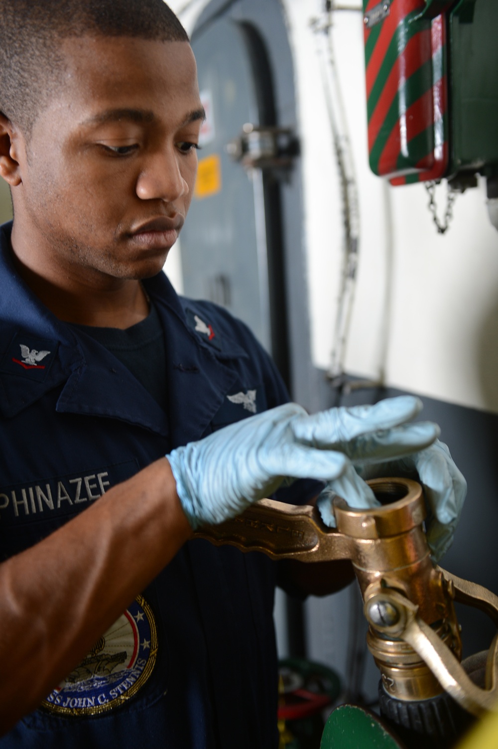 USS John C. Stennis sailors at work