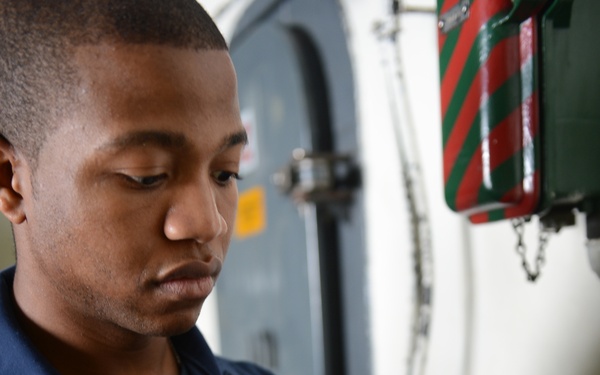 USS John C. Stennis sailors at work
