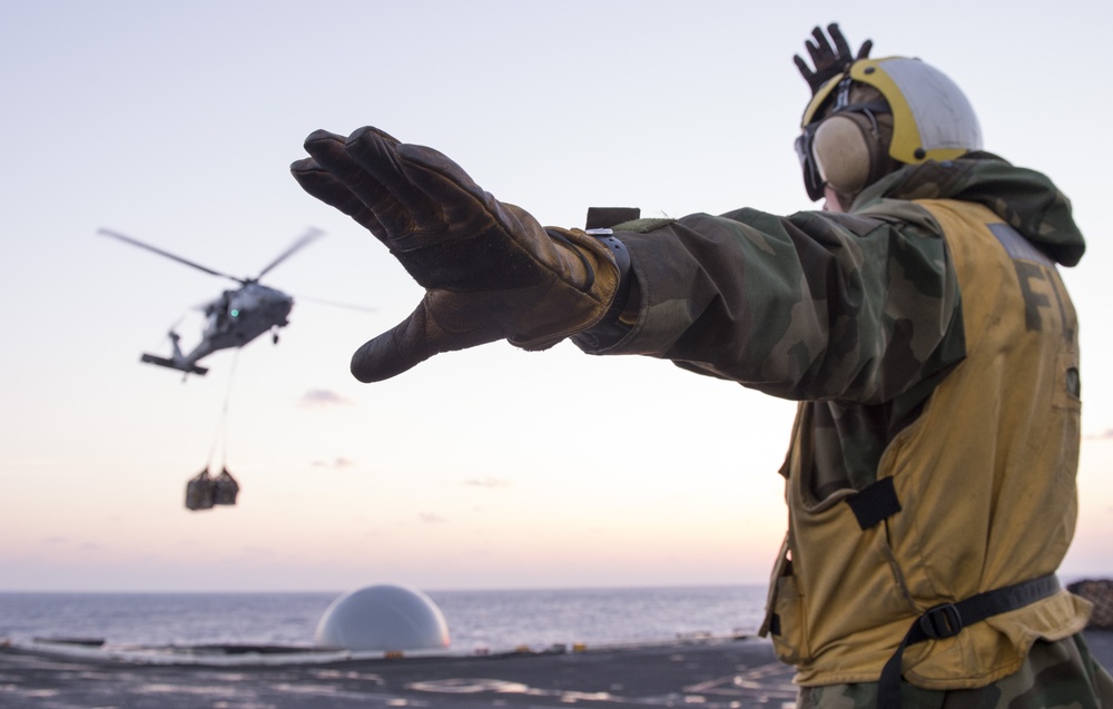 Directing the landing of an MH-60S Sea Hawk