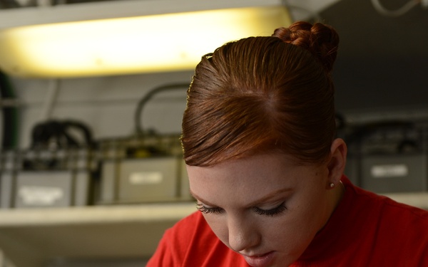 USS John C. Stennis sailors at work