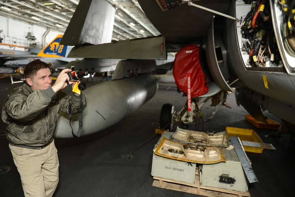 USS John C. Stennis sailors at work