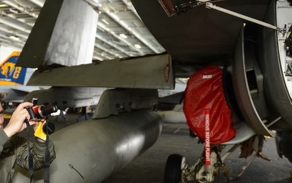 USS John C. Stennis sailors at work