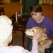 DCMA employees provide canine comfort to children and adults