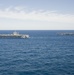 USS Enterprise passes USS Harry S. Truman