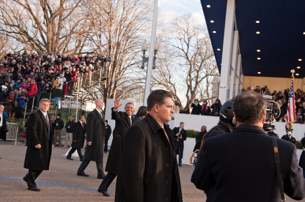 President Obama waves to the crowd in 57th Presidential Inaugural Parade