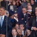President Obama and Vice President Biden watch the 57th Presidential Inaugural Parade