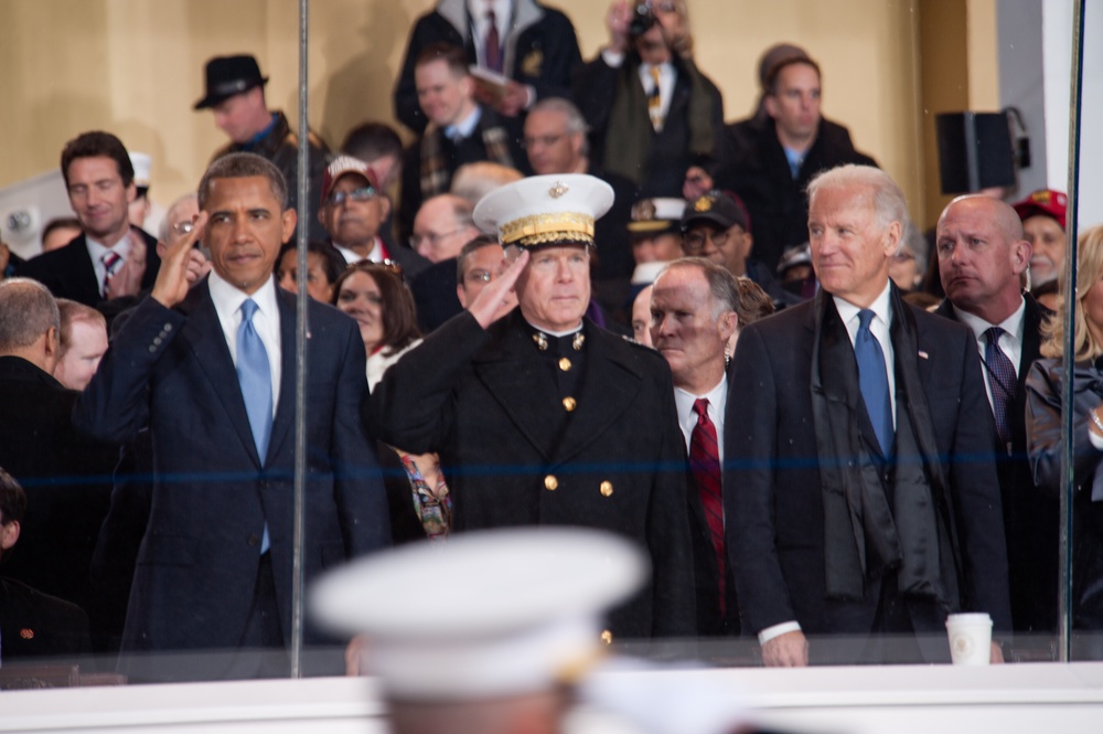 President Obama salutes the United States Navy