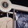 The Martin Luther King Jr. float at the 57th Presidential Inauguration This image shows an exhibition display featuring the Seal of the President of the United States, a large stone or rock sculpture, and a banner with a close-up photograph of a man alongside the partial quote 'Out of the Mountain of Despair a Stone of...' The display appears to be related to the Martin Luther King Jr. Memorial, referencing the famous quote that inspired the memorial's design. The setting appears to be an indoor exhibition or museum space.
