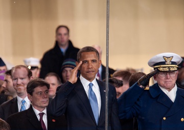 President Obama salutes the United States Coast Guard
