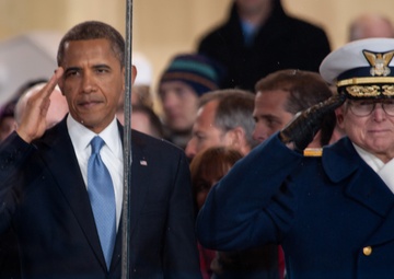 President Obama salutes the United States Coast Guard