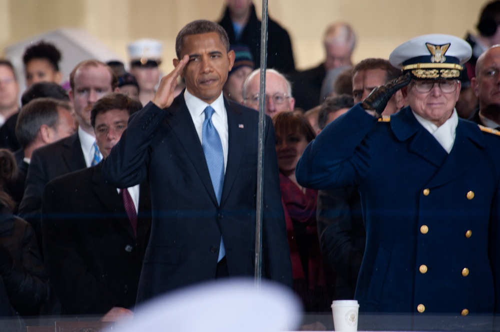 President Obama salutes the United States Coast Guard